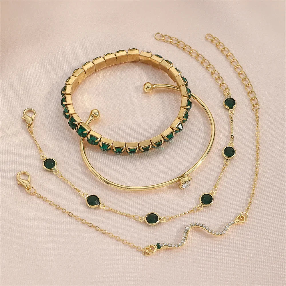 Juego de 4 pulseras de metal con gemas verdes y diamantes de imitación